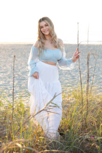 senior girl at the beach for her senior portrait