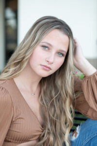 A headshot of a senior girl from Hagerty High School with Orlando Senior Photographer, Khim Higgins.