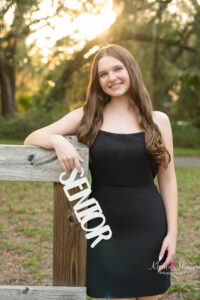 oviedo senior portrait at lake mills with khim higgins photography