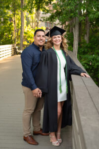 UCF graduation photo session with a boyfriend at the boardwalk.