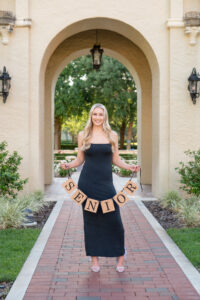 Senior girl at Rollins College for senior photos