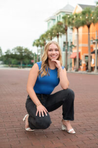 senior girl posing for her senior photos in Celebration, Fl.