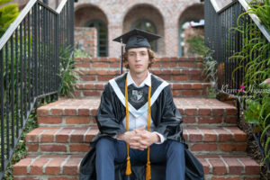Lake Mary senior boy photographer capturing a relaxed outdoor portrait of a high school senior boy.