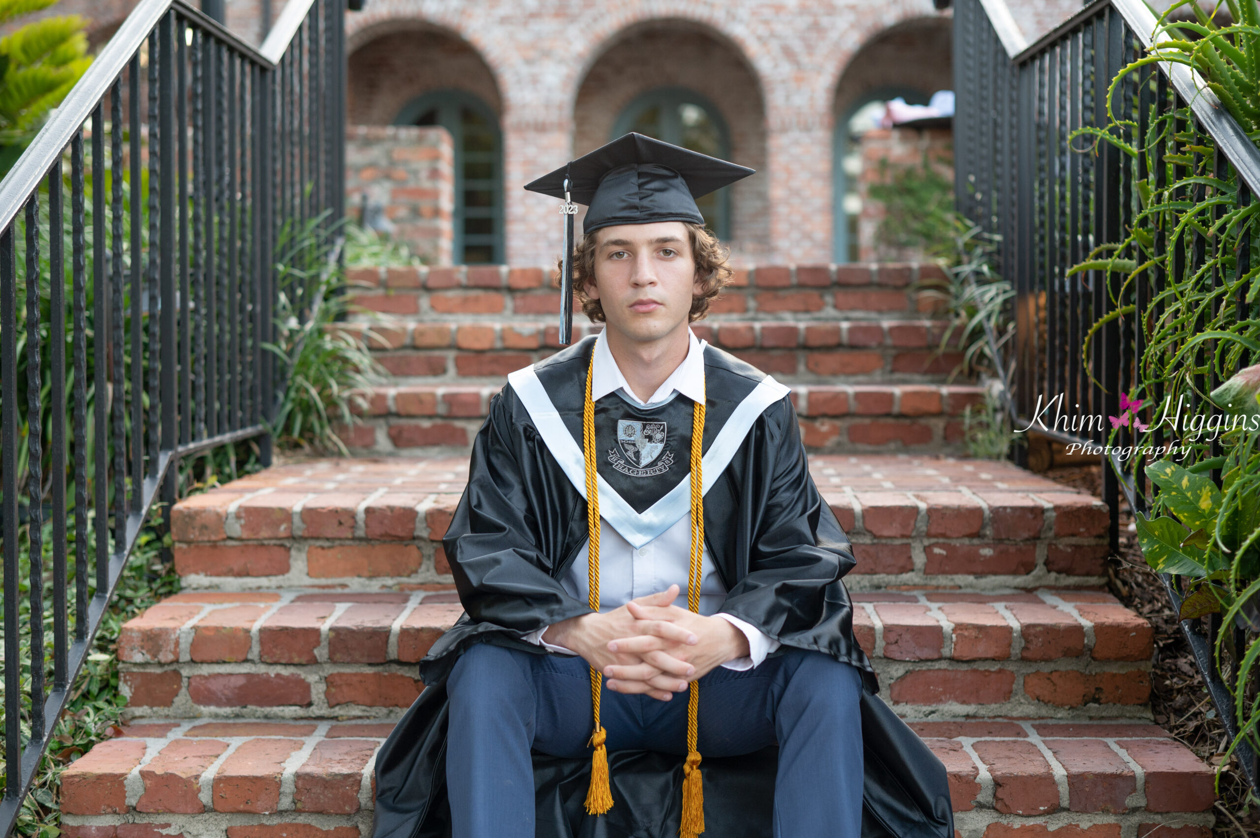 Lake Mary senior boy photographer capturing a relaxed outdoor portrait of a high school senior boy.