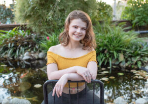 Senior portrait in Lake Mary with creative photography styling