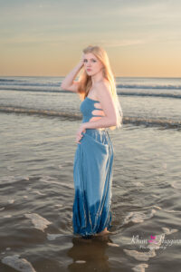 Senior girl walking along the shoreline at sunrise, beach senior portraits