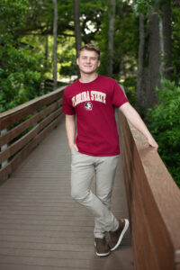 Senior boy in a college t shirt 