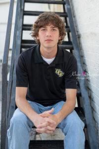 Orlando senior photographer working with a senior boy for casual and stylish photos.