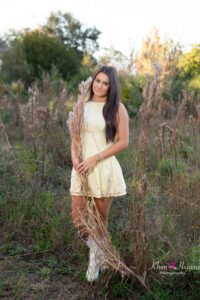 Golden hour senior portrait in Orlando – yellow dress with boots