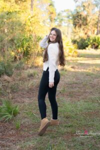 High school senior photos in Lake Mary at sunset