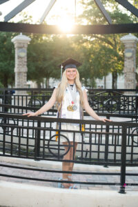 Oviedo senior portraits of high school graduate in cap and gown