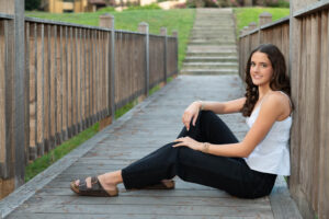 Orlando senior girl sitting at the dock