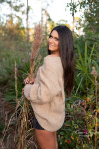 Senior girl from Oviedo High School during outdoor senior photo session