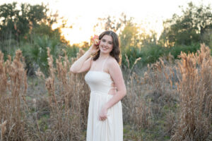 Golden hour senior portraits in Orlando open field